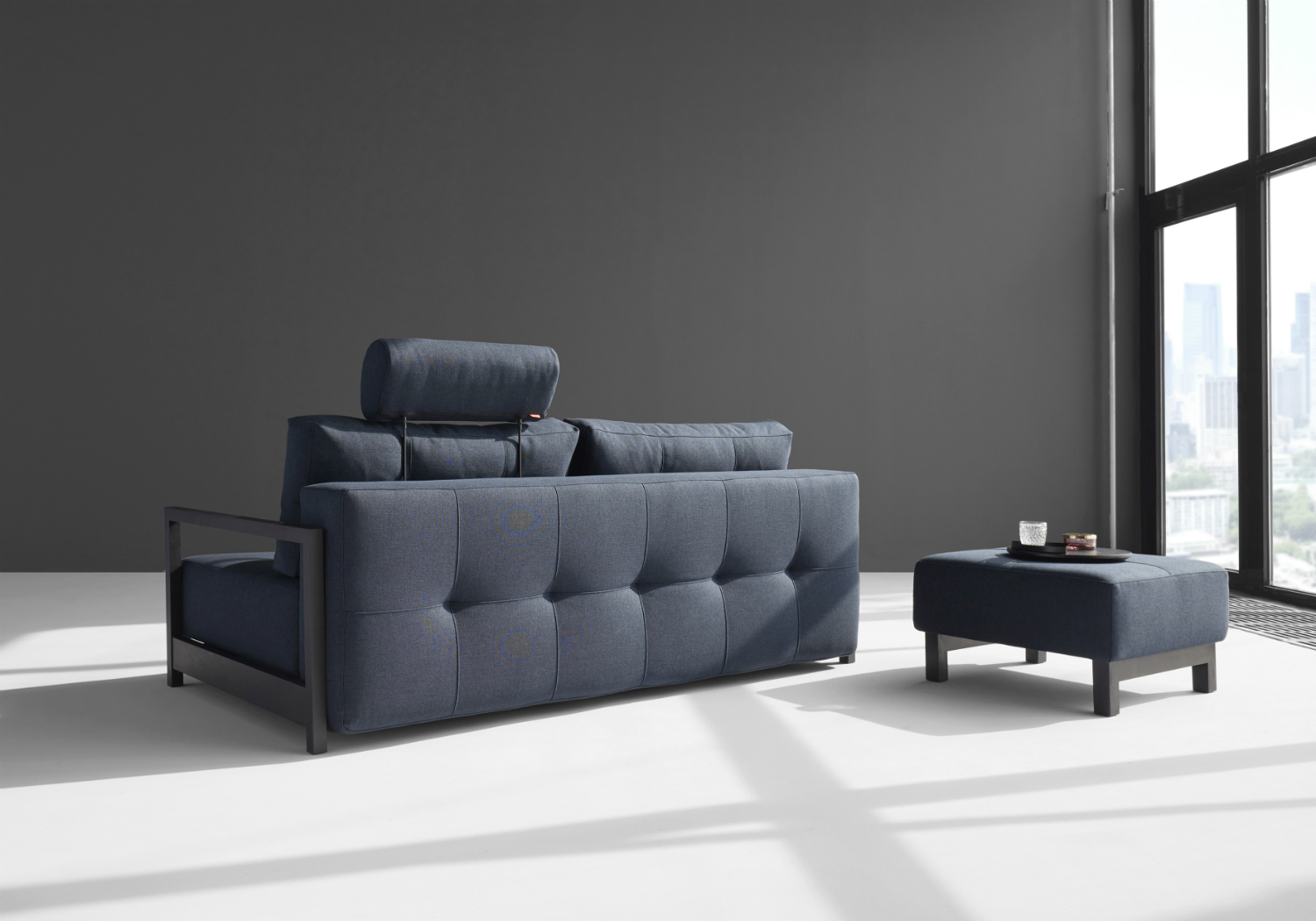 blue sofa bed and foot stool set