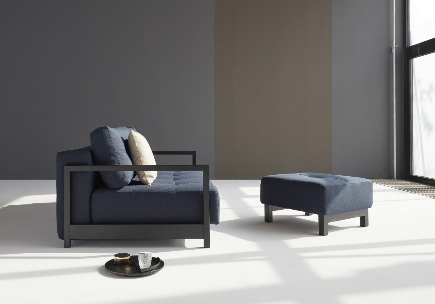 blue sofa bed and foot stool set