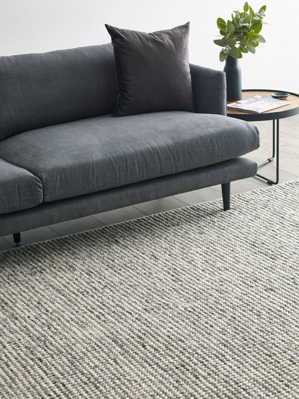 grey mat and sofa